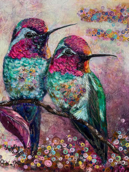 Original mixed media oil painting “Shared Silence” by Toronto artist Dalia Manoim, featuring two vibrant hummingbirds resting side by side on a branch. Painted on birch wood panel, the artwork blends soft pink, teal, and violet tones with gold highlights, symbolizing peace, harmony, and the rare beauty of connection in stillness.